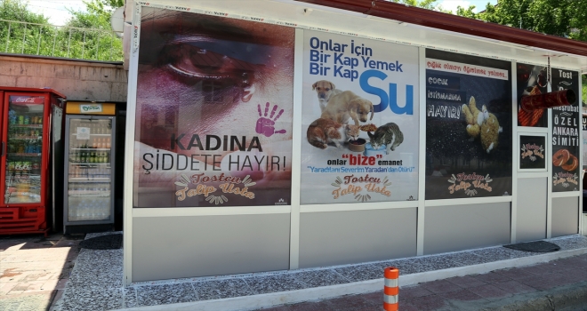 Büfesinin camlarını kadın, çocuk ve sokak hayvanları için kaplattı